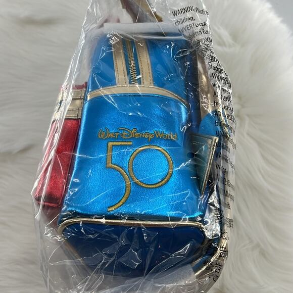 Loungefly Blue and Red Backpack with Gold Accents - Picture 4 of 7